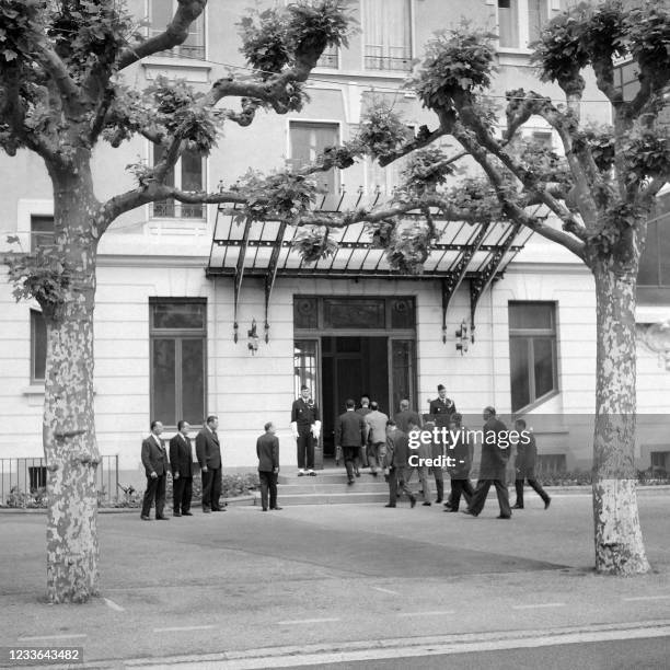 The Provisional Government of the Algerian Republic delegation led by Belkacem Krim arrives at the Hôtel du Parc on May 20, 1961 in Evian to...