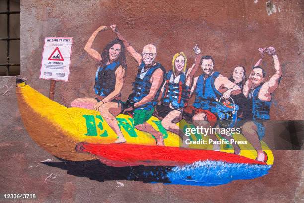 New mural made by Italian street artist Harry Greb named "Enjoy - Tutti al mare" in via dei Montecatini in Rome featuring Giorgia Meloni, Matteo...