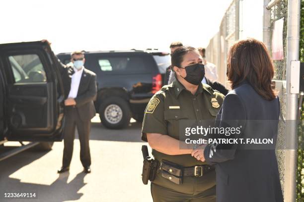 Vice President Kamala Harris , speaks with El Paso Border Patrol Chief agent Gloria Chavez as she tour the US Customs and Border Protection Central...