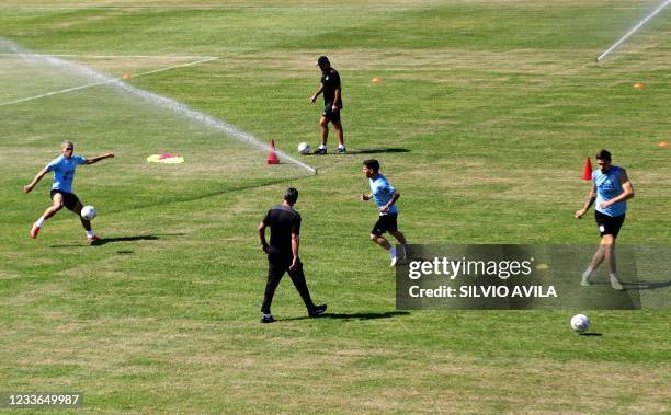 Uruguay's national football team players take part in a training session at the Eurico Gaspar Dutra Stadium, in Cuiaba, Brazil, on June 25, 2021.