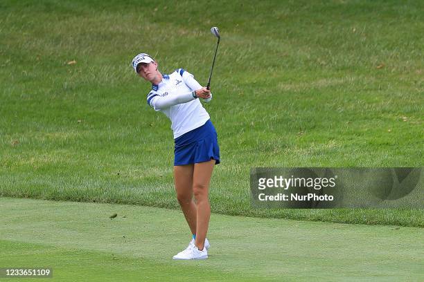 Nelly Korda of Bradenton, Florida hits to the 16th green from the fairway during the final round of the Meijer LPGA Classic golf tournament at...