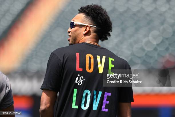 Edwin Díaz of the New York Mets warms up with a Love is Love shirt in honor of Pride Night before game one of a doubleheader against the Philadelphia...