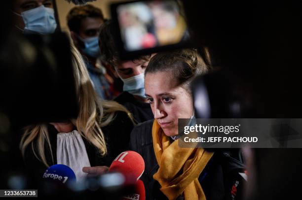 Valerie Bacot talks to journalists as she leaves Chalon-sur-Saone Courthouse, flanked by relatives and lawyers in Chalon-sur-Saone, central-eastern...