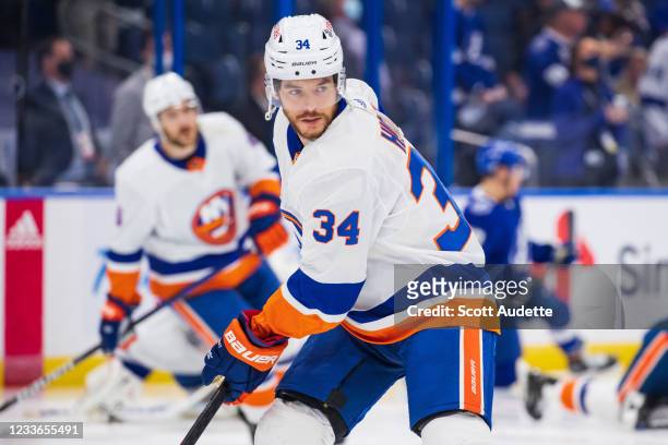 Cole Bardreau of the New York Islanders skates against the Tampa Bay Lightning during the pregame warm ups in Game Seven of the Stanley Cup...