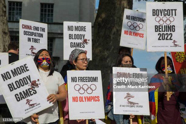 Free Tibet campaigners and members of the Hong Kong, Tibetan and Uyghur communities hold a rally opposite Downing Street as part of a global day of...