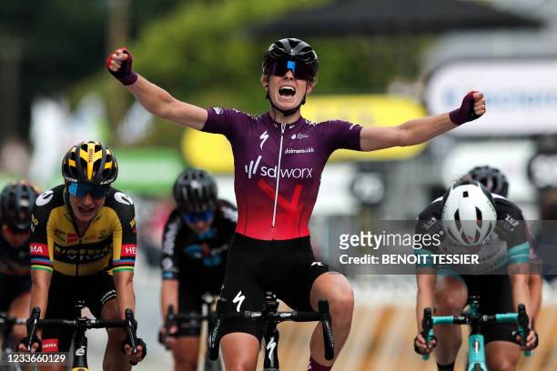 Team SD Worx rider Demi Vollering of Netherlands celebrates as she crosses the finish line during "la course by le tour" women's race, 1st stage of...