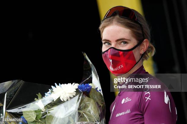 Team SD Worx rider Demi Vollering of Netherlands celebrates on the podium during "la course by le tour" women's race after the 1st stage of the 108th...