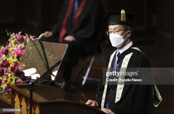 University of Tokyo President Teruo Fujii gives an address during a welcoming ceremony held at the Hongo campus in Tokyo on June 26 for students who...