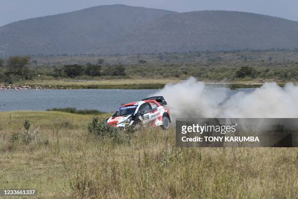 British driver Elfyn Evans steers his Toyota Yaris WRC with British co-driver Scott Martin during the SS11 stage of the 2021 Safari Rally Kenya near...