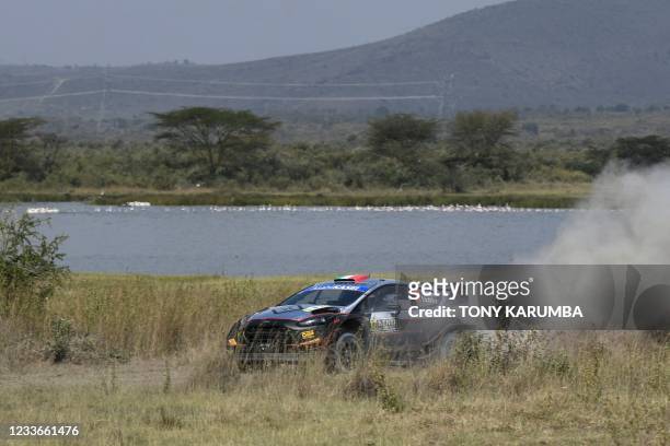 Italian driver Lorenzo Bertelli steers his Ford Fiesta WRC with Italian co-driver Simone Scattolin during the SS11 stage of the 2021 Safari Rally...