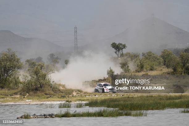 Kenyan driver Karan Patel steers his Ford Fiesta with Kenyan co-driver Tauseef Khan during the SS11 stage of the 2021 Safari Rally Kenya near Lake...