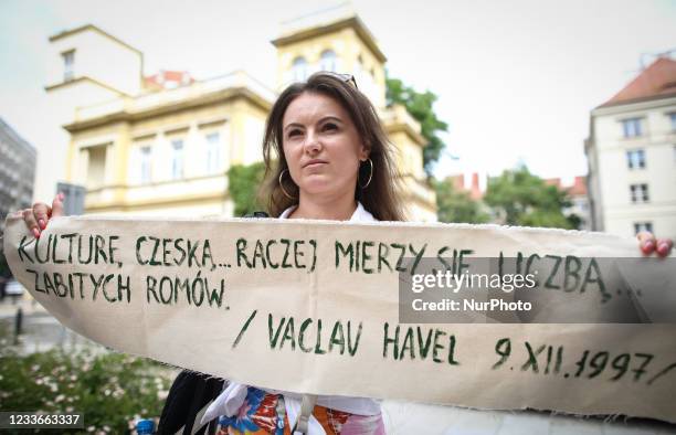 Woman holds a banner with a quote by former president of the Czech Republic, the late Vacla Havel in Warsaw, Poland on June 26, 2021. Last week a...