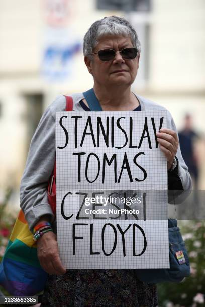 Woman commonly known as Grandma Kasia is seen with a sign with the words &quot;Satnislav Tomas is the Czech George Floyd&quot; in Warsaw, Poland on...