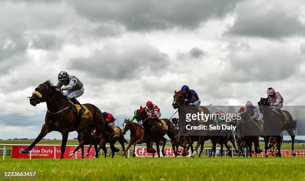 Kildare , Ireland - 26 June 2021; Romantic Proposal, left, with Chris Hayes up, on their way to winning the Dubai Duty Free Dash Stakes during day...