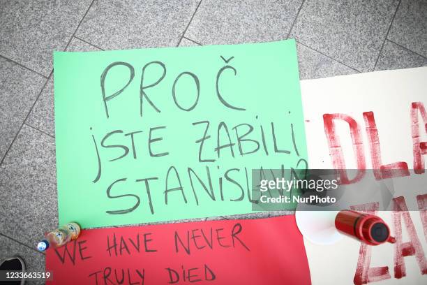 Sign with the words in Czech &quot;Why did you kill Stanislav&quot; is seen during a rally at the Czech embassy in Warsaw, Poland on June 26, 2021....