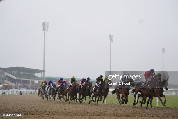 Runners and riders during the William Hill Pick Your Places Northumberland Vase Handicap race, during the William Hill Northumberland Plate Day at...