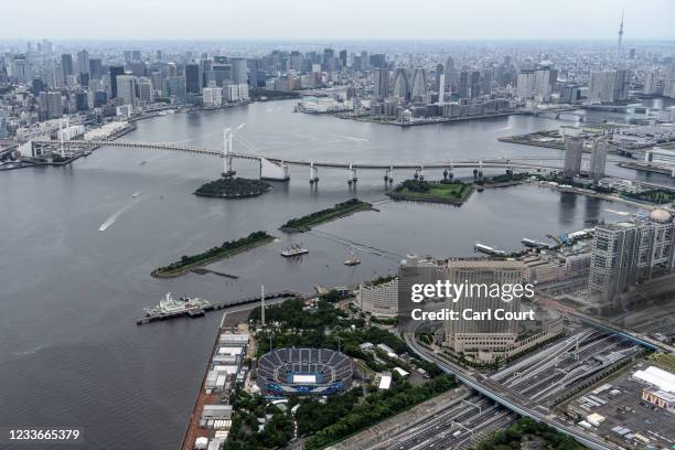 Tokyo Bay, Odaiba Marine Park and the Tokyo Olympic beach volleyball stadium are pictured from a helicopter on June 26, 2021 in Tokyo, Japan. With...