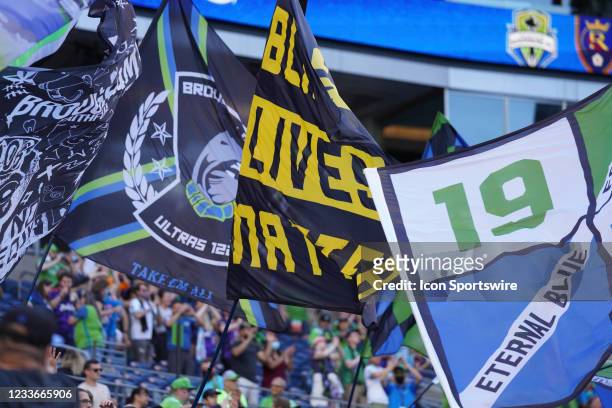 Fans present their flags during a MSL match on June 23, 2021 between Real Salt Lake and the Seattle Sounders at Lumen Field in Seattle, WA.