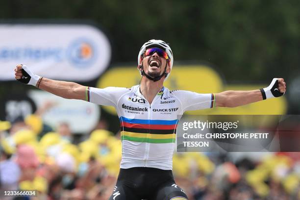 Team Deceuninck Quickstep's Julian Alaphilippe of France celebrates as he crosses the finish line to win the 1st stage of the 108th edition of the...
