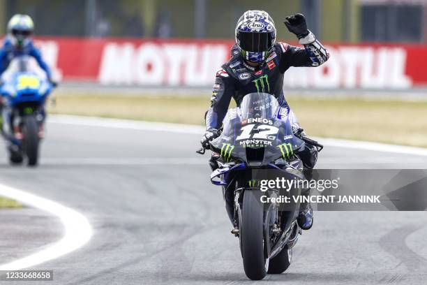 Spain's Maverick Vinales on his Yamaha reacts after setting the fastest time in MotoGP qualifying practice at the TT circuit of Assen on June 16,...