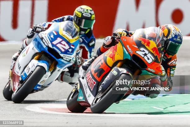 Swiss Thomas Luthi on his Kalex, Spain's Raul Fernandez on his Kalex in action during the Moto2 qualifying practice at the TT circuit of Assen on...