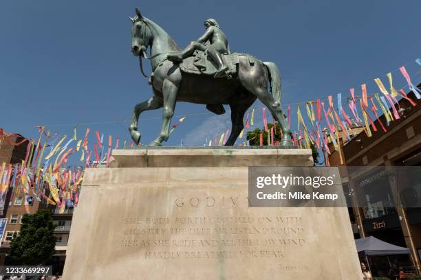 Godiva statue underneath colourful bunting hanging in Broadgate in the UK City of Culture 2021 on 23rd June 2021 in Coventry, United Kingdom. The...