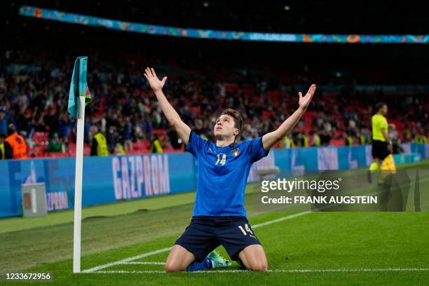 Italy's midfielder Federico Chiesa celebrates after scoring the opening goal during the UEFA EURO 2020 round of 16 football match between Italy and...