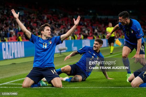 Italy's midfielder Federico Chiesa celebrates after scoring the first goal during the UEFA EURO 2020 round of 16 football match between Italy and...
