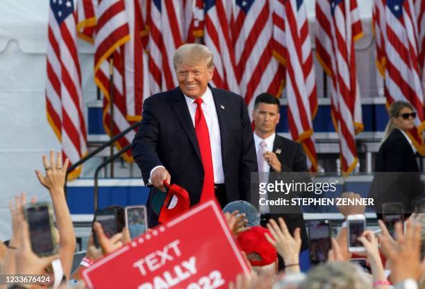 Former US President Donald Trump arrives for his campaign-style rally in Wellington, Ohio, on June 26, 2021. - Donald Trump held his first big...