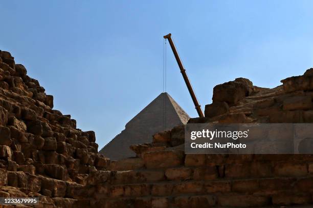 Preparations for the transfer of the procession of King Khufu from the bottom of the pyramids to the - the Grand Egyptian Museum. The transportation...