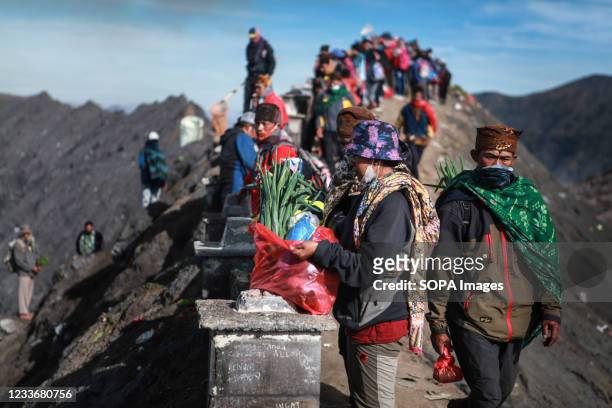 Tenggerese gather during the Yadnya Kasada Festival at crater of Mount Bromo amid the coronavirus pandemic. Tenggerese people are a Javanese ethnic...