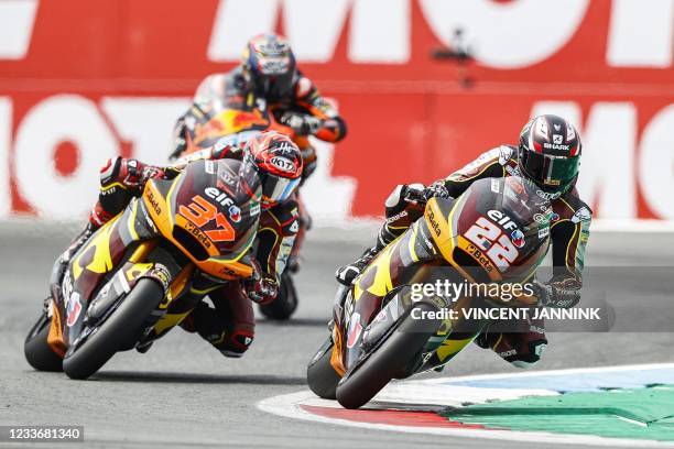 Spain's Kalex driver Augusto Fernandez and Britain's Kalex driver Sam Lowes steer their motorbikes during the Moto2 race at the TT circuit of Assen...