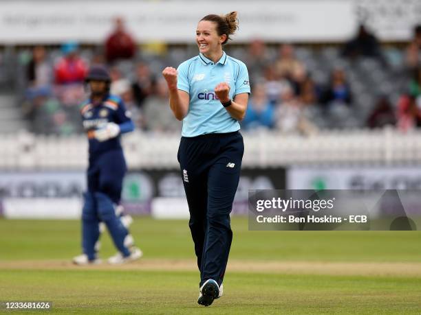 Kate Cross of England celebrates taking the wicket of Punam Raut of India during the women's first one day international between England and India at...