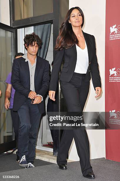 Actors Louis Garrel and Monica Bellucci arrive at the "Un Ete Brulant" photocall at the Palazzo del Cinema during the 68th Venice Film Festival on...