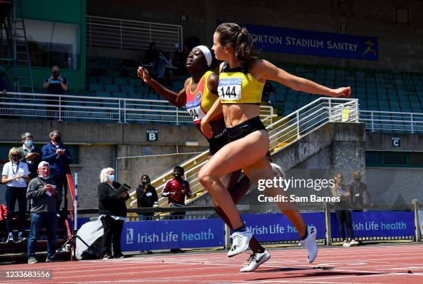 Dublin , Ireland - 27 June 2021; Phil Healy of Bandon AC, Cork, right, dips for the line to win the Women's 200m ahead of Rhasidat Adeleke of...