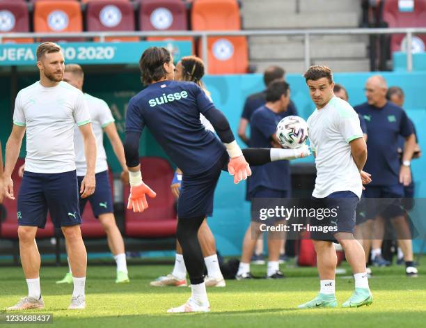 Xherdan Shaqiri of Switzerland look on during the training at the National Arena on June 27, 2021 in Bucharest, Romania.