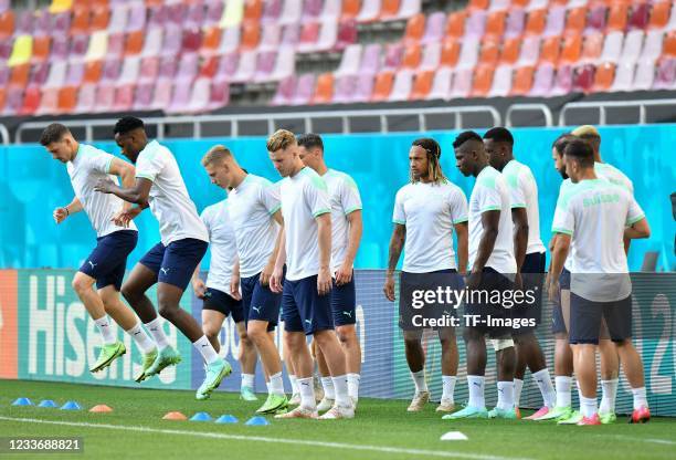 Th player's of Switzerkand warm up during the training at the National Arena on June 27, 2021 in Bucharest, Romania.