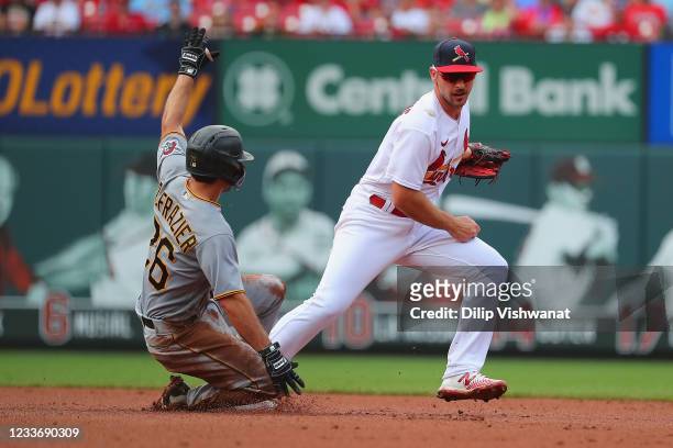 Adam Frazier of the Pittsburgh Pirates is a safe at second base against Paul DeJong of the St. Louis Cardinals in the fourth inning at Busch Stadium...
