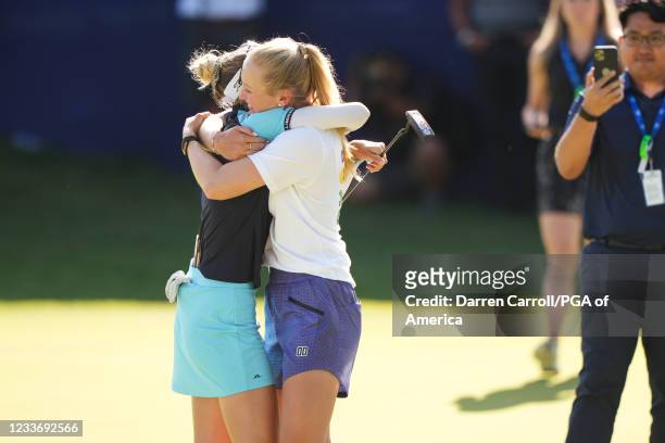 Nelly Korda hugs her sister Jessica Korda after the final round for the 2021 KPMG Women's Championship at the Atlanta Athletic Club on June 27, 2021...