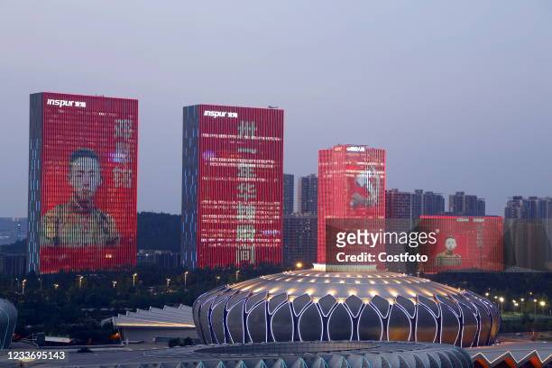 Light show featuring the centenary of the founding of the Communist Party of China is staged in more than 60 buildings in Jinan, Shandong Province,...