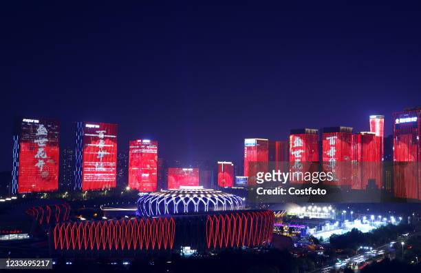Light show featuring the centenary of the founding of the Communist Party of China is staged in more than 60 buildings in Jinan, Shandong Province,...
