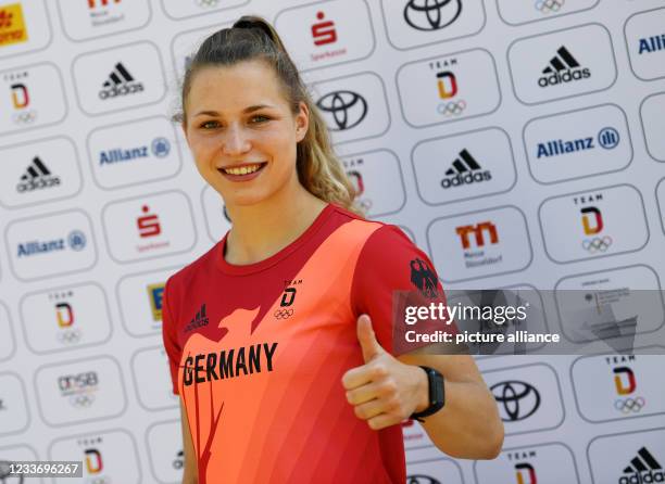 June 2021, Bavaria, Munich: Judoka Theresa Stoll wears a new top while dressing part of the German Olympic team. Photo: Angelika Warmuth/dpa