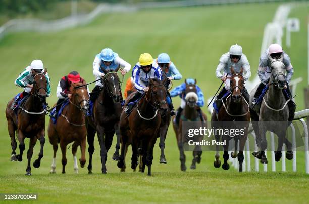 General view of the runners and riders in action as they compete in the Wayne Conway Memorial Handicap at Pontefract Racecourse on June 28, 2021 in...