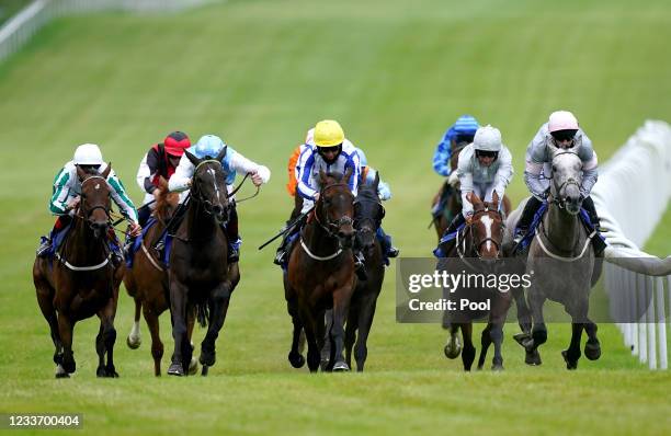 General view of the runners and riders in action as they compete in the Wayne Conway Memorial Handicap at Pontefract Racecourse on June 28, 2021 in...