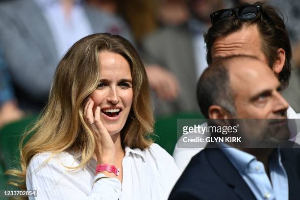 Kim Sears, wife of Britain's Andy Murray, arrives on Centre Court to watch her husband play against Georgia's Nikoloz Basilashvili in their men's...