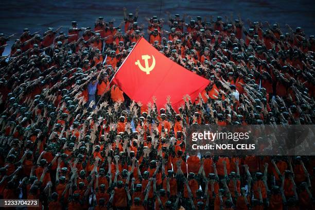 Performers dance during a Cultural Performance as part of the celebration of the 100th Anniversary of the Founding of the Communist Party of China,...