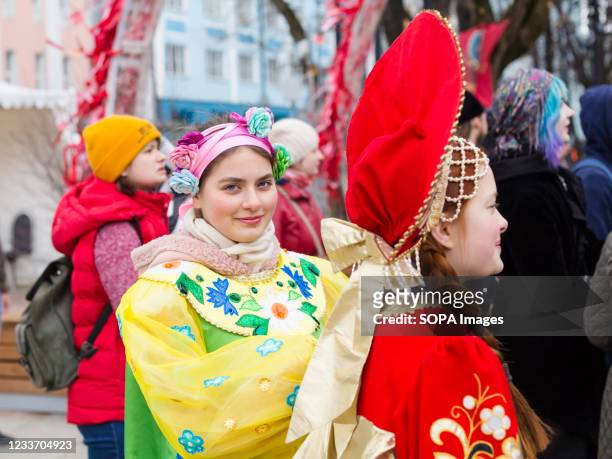 Young ladies seen in traditional national Russian costumes during the festival. Concerts of classical, folk music and bell ringing, theatrical...
