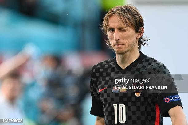 Croatia's midfielder Luka Modric winks at the end of the UEFA EURO 2020 round of 16 football match between Croatia and Spain at the Parken Stadium in...