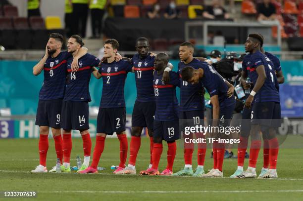 The player's of France look dejected during the UEFA Euro 2020 Championship Round of 16 match between France and Switzerland at National Arena on...