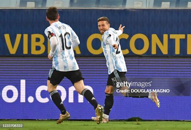 Argentina's Alejandro Gomez celebrates with teammate Lionel Messi for his assist, after scoring against Bolivia during the Conmebol Copa America 2021...